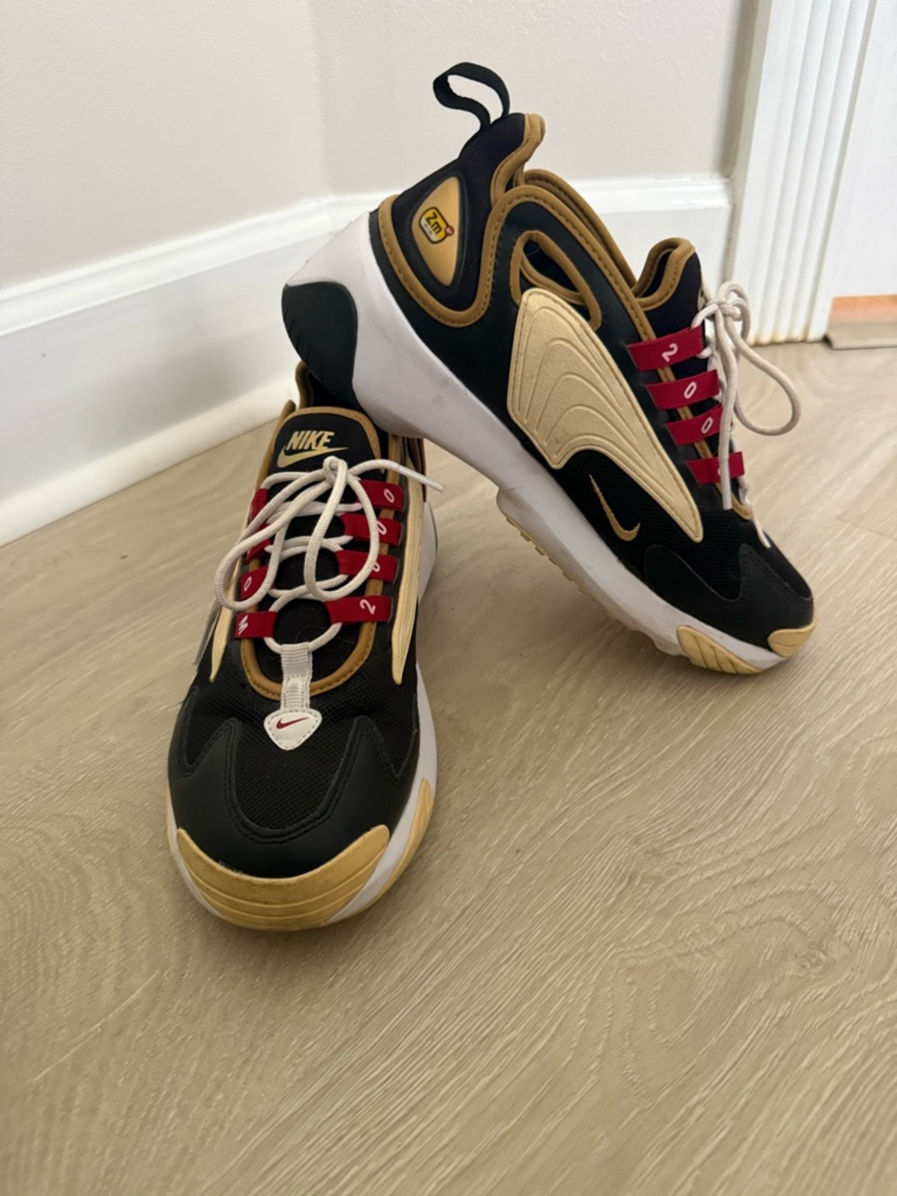 Nike Women’s Black and Gold Athletic Sneakers